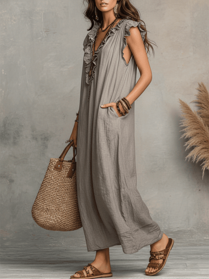 Robe maxi fluide bohème sans manches à volants et col en V