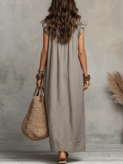 Robe maxi fluide bohème sans manches à volants et col en V