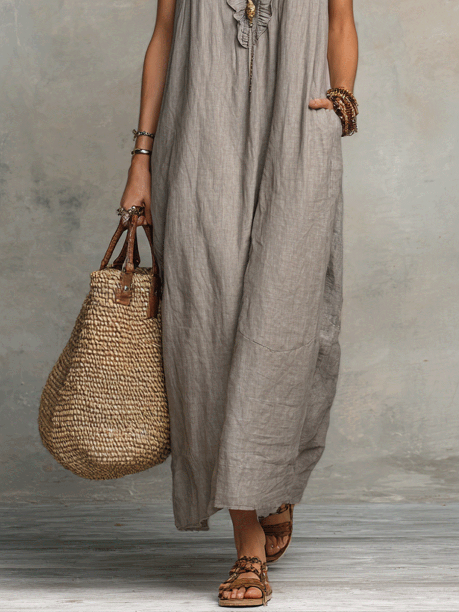 Robe maxi fluide bohème sans manches à volants et col en V
