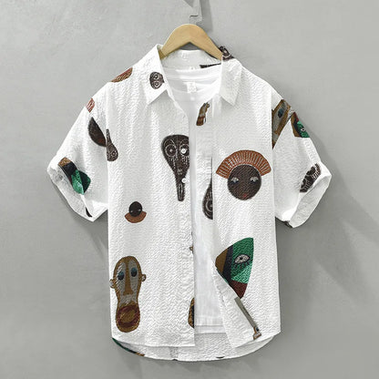 Oruka Shirt Featuring Tribal Art and Cubist Abstract Faces Design