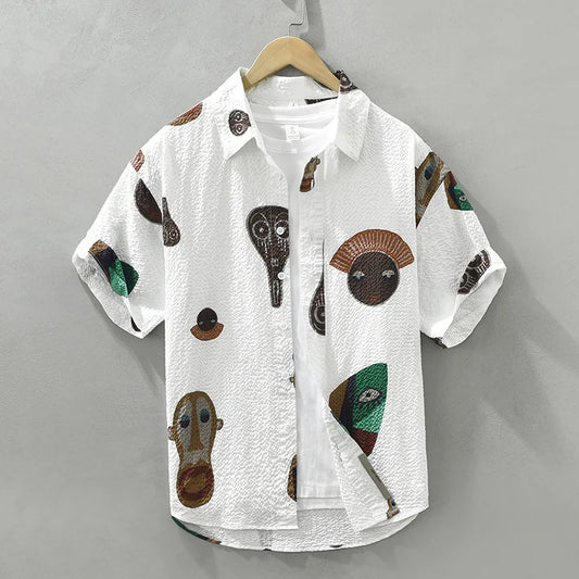 Oruka Shirt Featuring Tribal Art and Cubist Abstract Faces Design