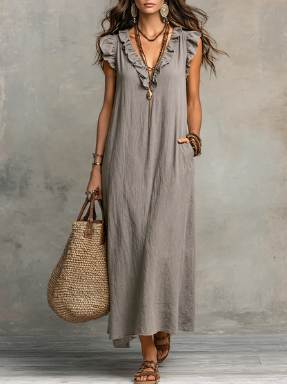 Robe maxi fluide bohème sans manches à volants et col en V